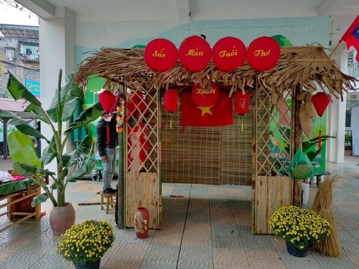 trang trí cổng trại hội chợ xuân